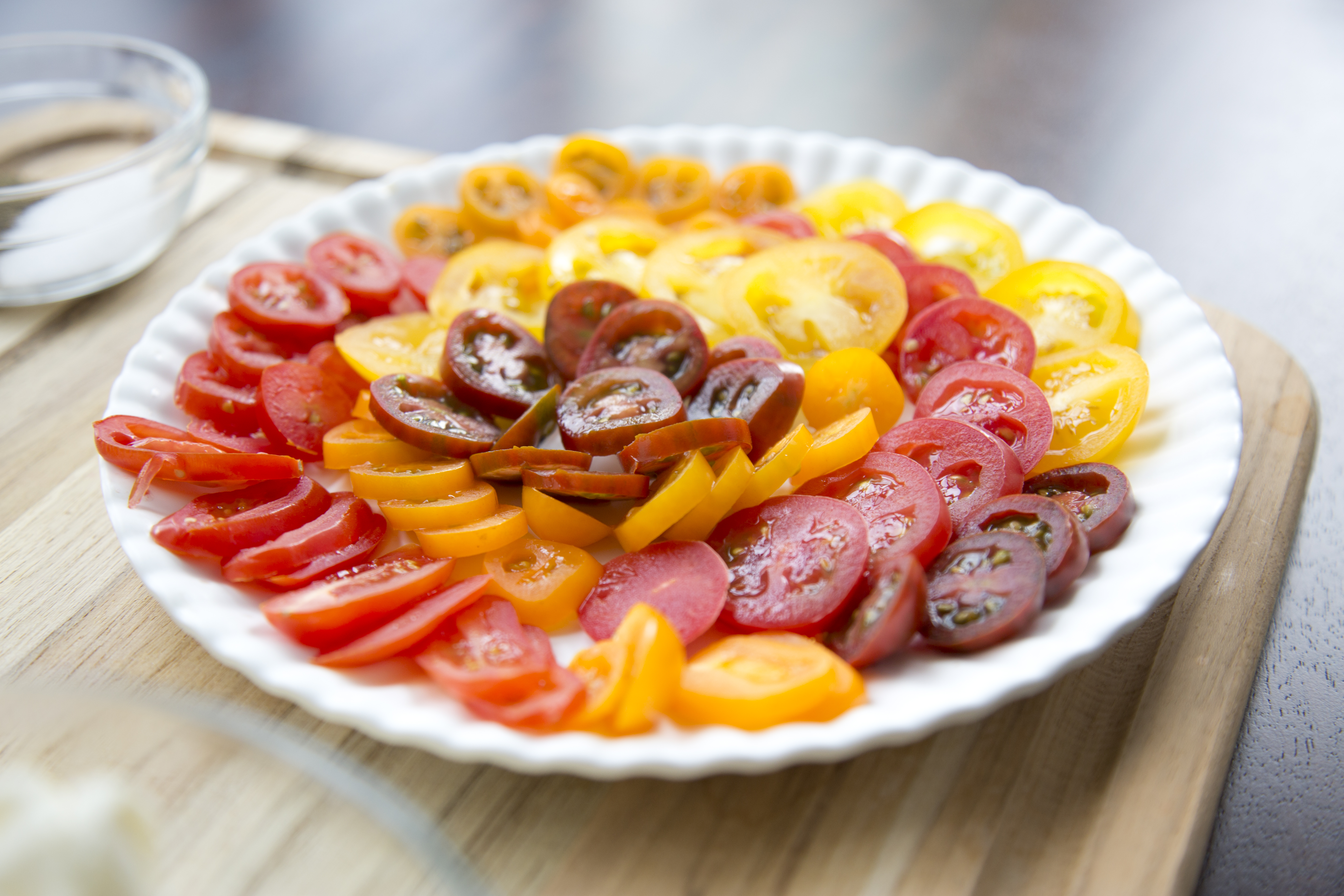 Heirloom tomatoes come in a variety of colors like red, orange and purple. 